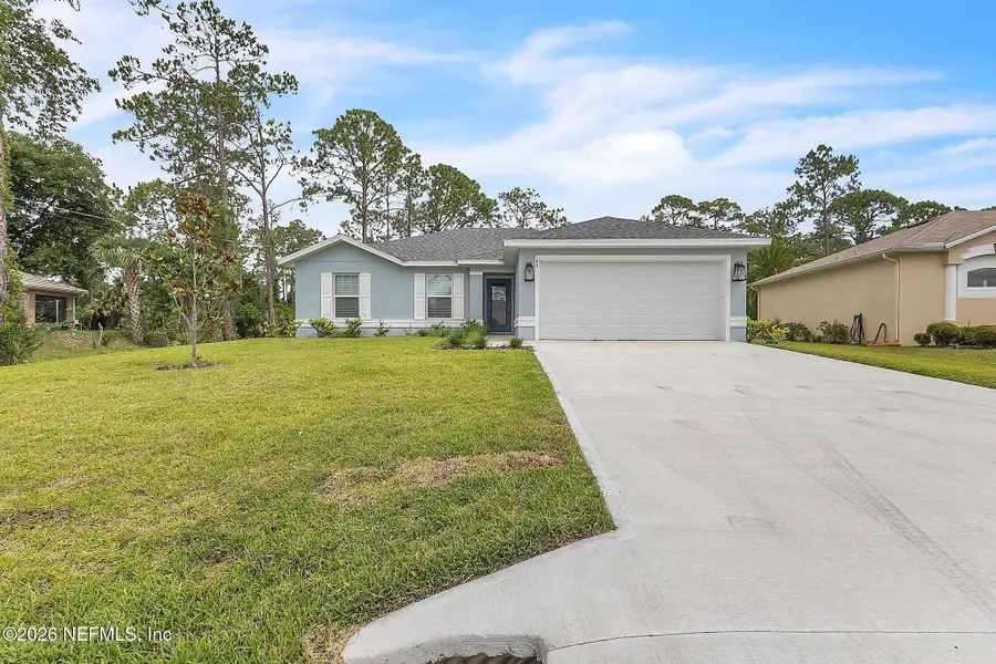 Front exterior of a new home in , Palm Coast, FL, highlighting curb appeal (Image 23).