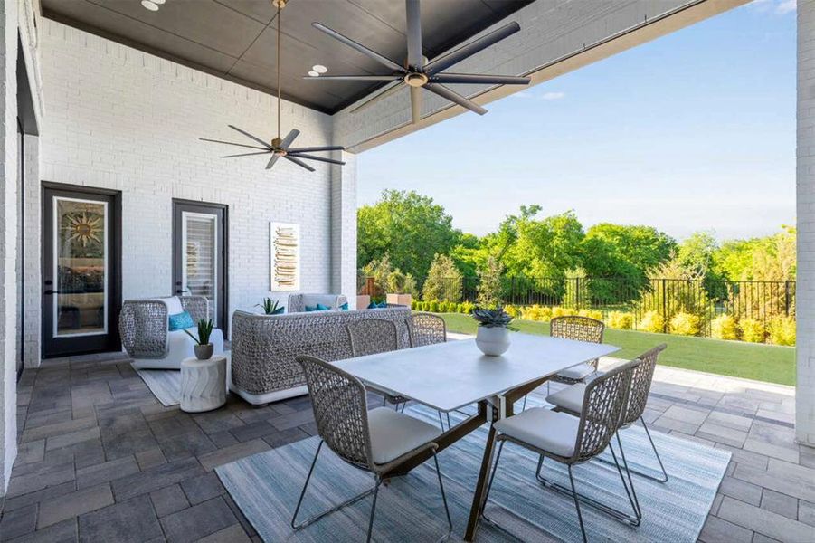 Exterior details and patio area of a home in Estates at Bristol Valley, Heath (Image 19).