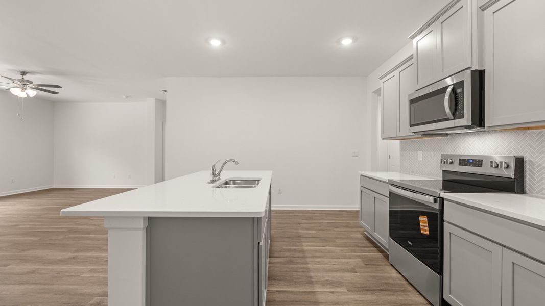 Representative furnished interior of a home built from the Cali by D.R. Horton in The Reserve at Calcutta, Stockbridge (Image 7).