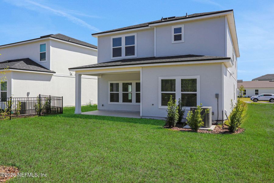 Exterior details and patio area of a home in Amberly, Green Cove Springs (Image 28).