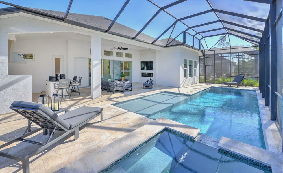 Exterior details and patio area of a home in Woodhaven, Port Orange (Image 22).