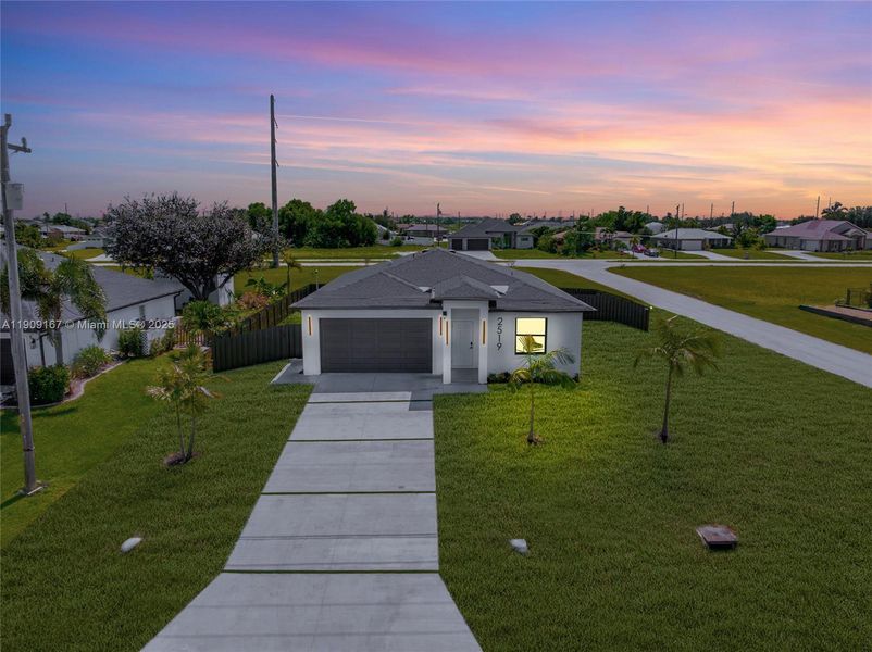 Front exterior of a new home in , Cape Coral, FL, highlighting curb appeal (Image 2). Front exterior of a new home in , Cape Coral, FL, highlighting curb appeal (Image 2).