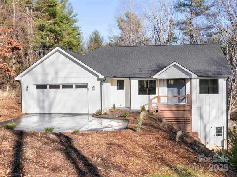 Front exterior of a new home in , Mills River, NC, highlighting curb appeal (Image 2).