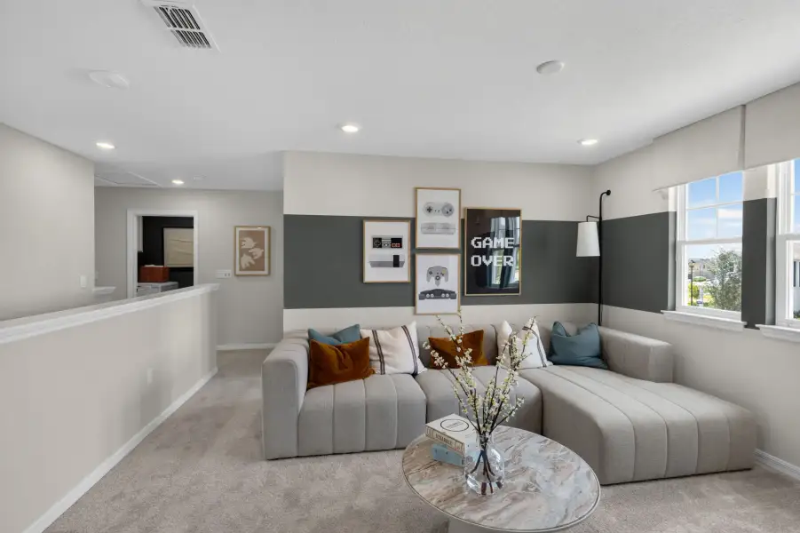 Representative furnished interior of a home built from the Imperial by Pulte Homes in Waypointe, Port Orange (Image 16).