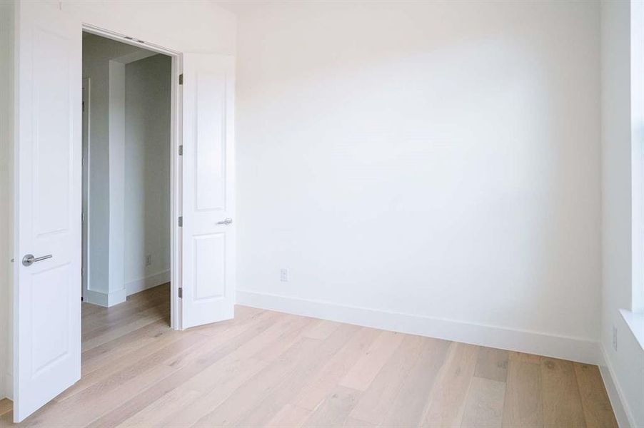 Empty room featuring light hardwood / wood-style floors