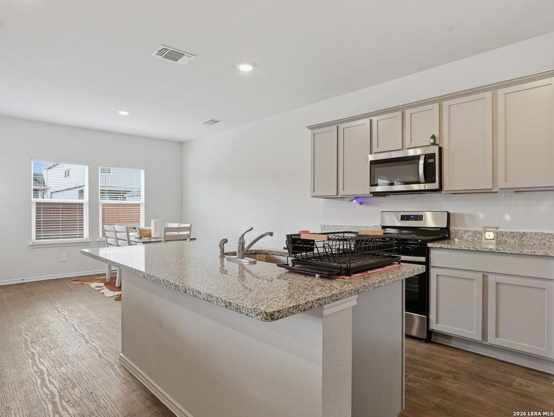 Furnished interior view inside a new home in Watermill, Uhland (Image 27).