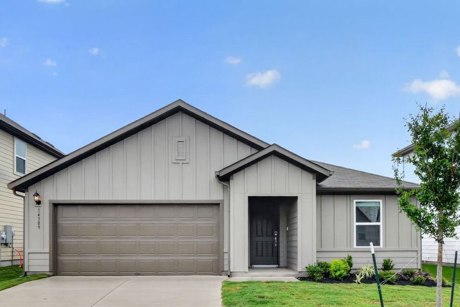 Representative exterior photo of a completed home built from the Bluejay by Taylor Morrison in Longview, Del Valle, TX (Image 22). Representative exterior photo of a completed home built from the Bluejay by Taylor Morrison in Longview, Del Valle, TX (Image 22).