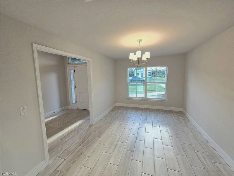 Spacious, unfurnished interior of a new home in Greenbriar, Lehigh Acres (Image 7).