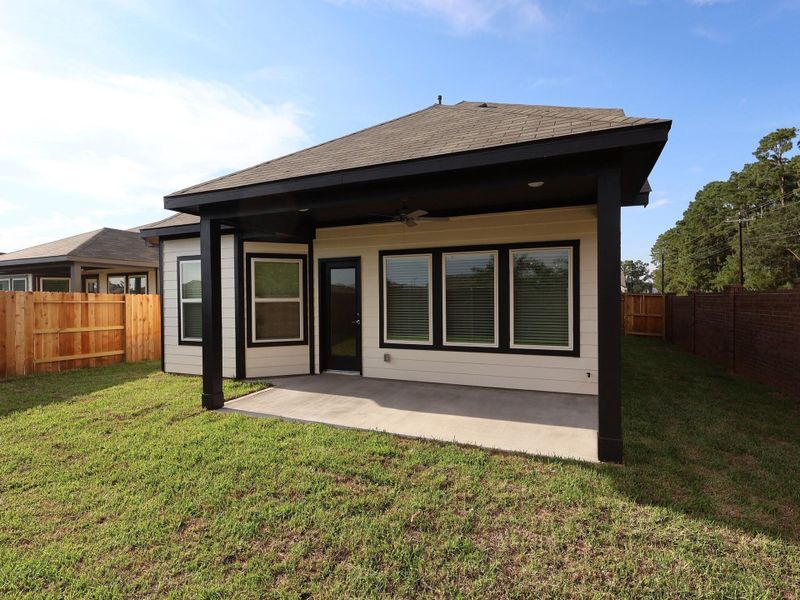 Front exterior of a new home in Lone Star Landing, Montgomery, TX, highlighting curb appeal (Image 13). Front exterior of a new home in Lone Star Landing, Montgomery, TX, highlighting curb appeal (Image 13).