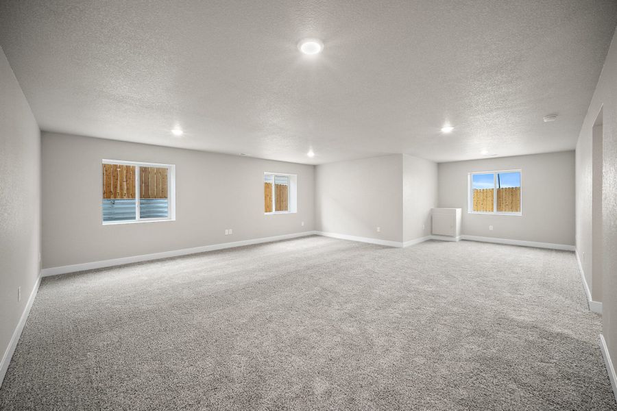Spacious, unfurnished interior of a new home in Ridge at Lorson Ranch, Colorado Springs (Image 32).