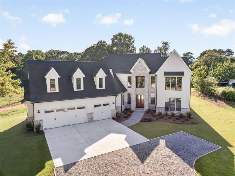 Front exterior of a new home in , Cumming, GA, highlighting curb appeal (Image 19).