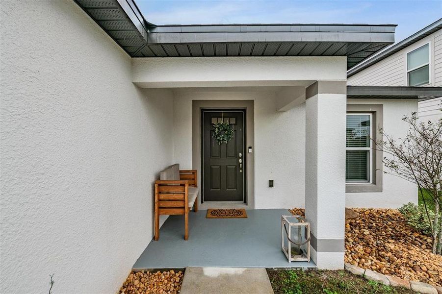 Exterior details and patio area of a home in Trilby Crossing, Brooksville (Image 3).
