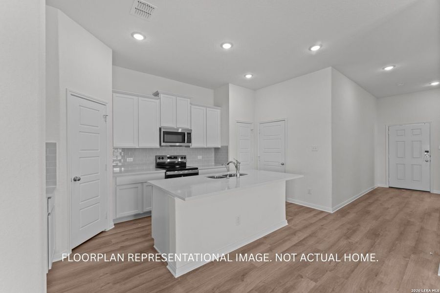 Furnished interior view inside a new home in High Branch, San Marcos (Image 9).