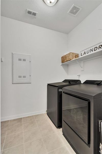 Large laundry room with extra storage space Large laundry room with extra storage space