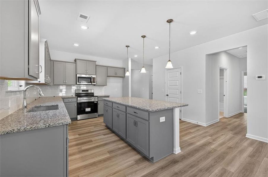 Furnished interior view inside a new home in Summerfield Place, Carrollton (Image 4).