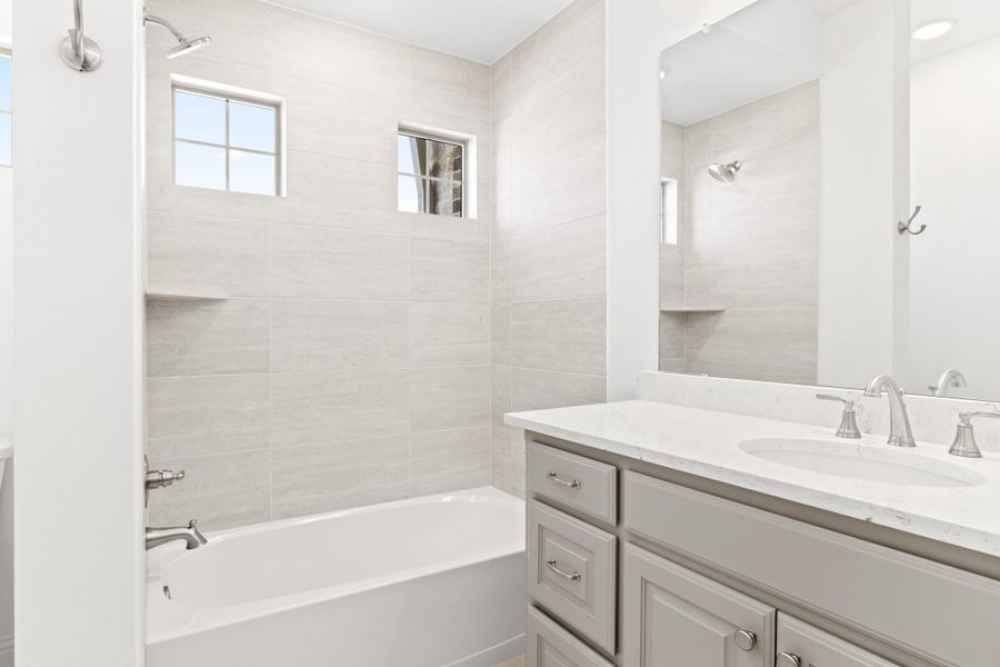 Furnished interior view inside a new home in The Tribute, The Colony (Image 19).