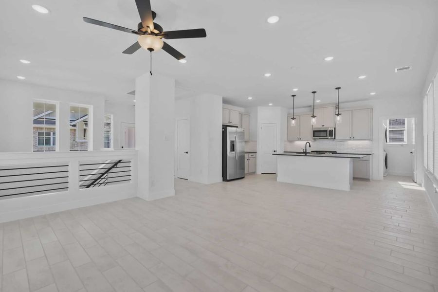 Spacious, unfurnished interior of a new home in Elyson Courtyard Collection, Katy (Image 8).