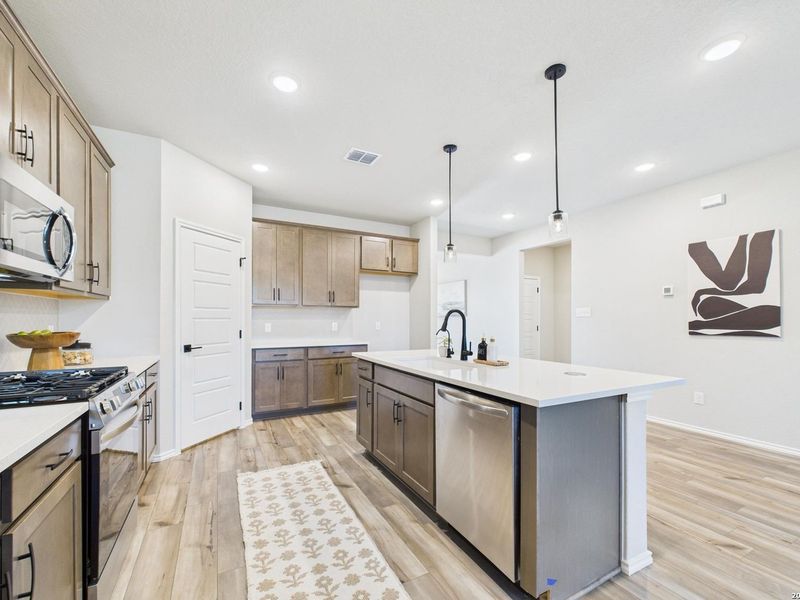 Furnished interior view inside a new home in Bricewood, San Antonio (Image 12).