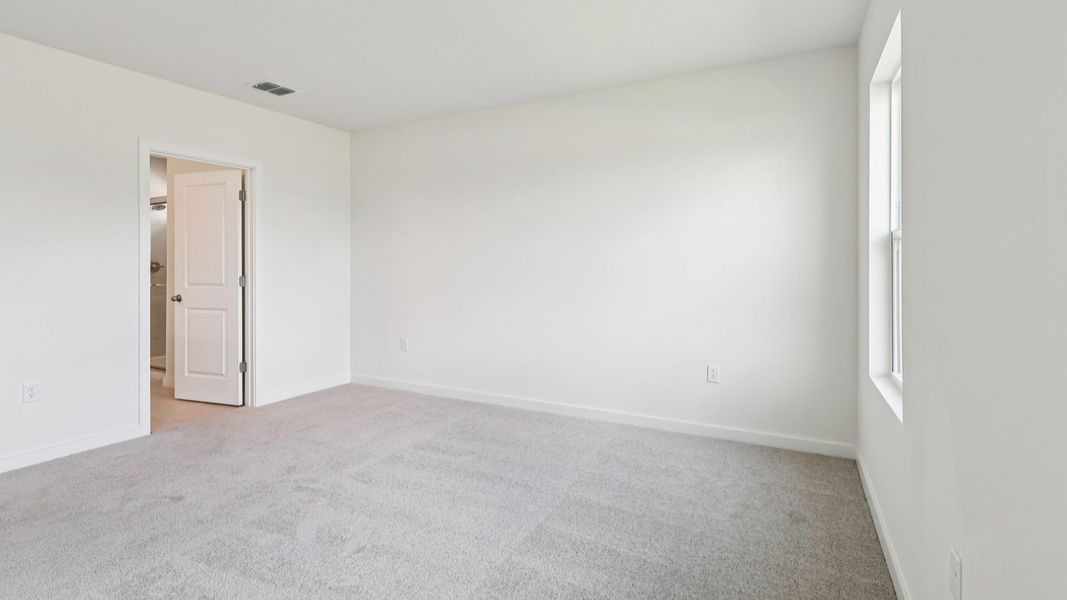 Representative unfurnished interior of a home built from the Baker by DRB Homes in Liberty Trace, Haines City (Image 34).