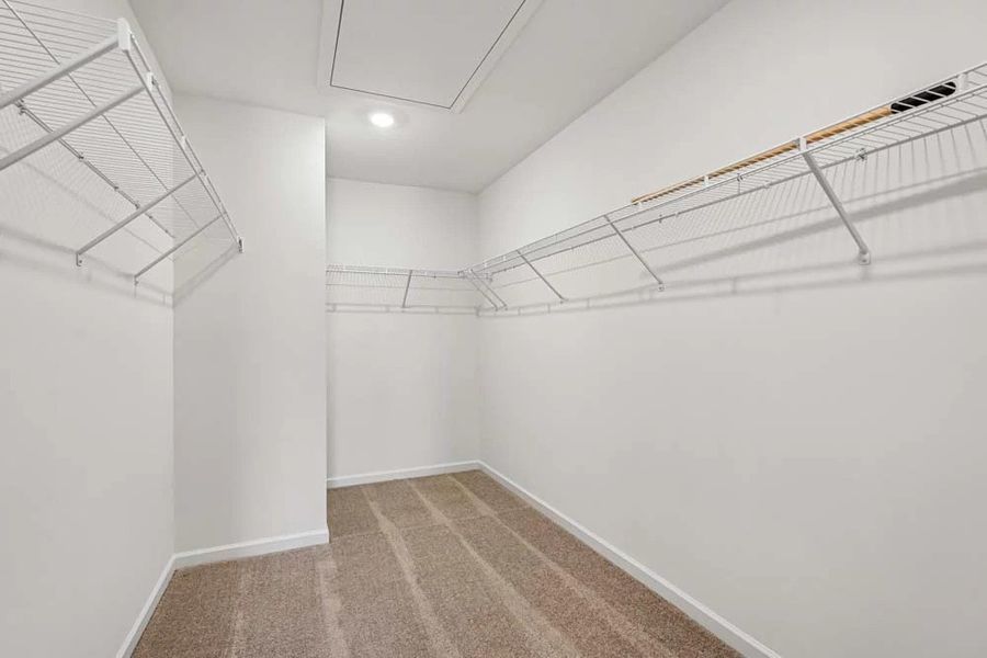 Representative Photo: Primary Bedroom Walk-In Closet