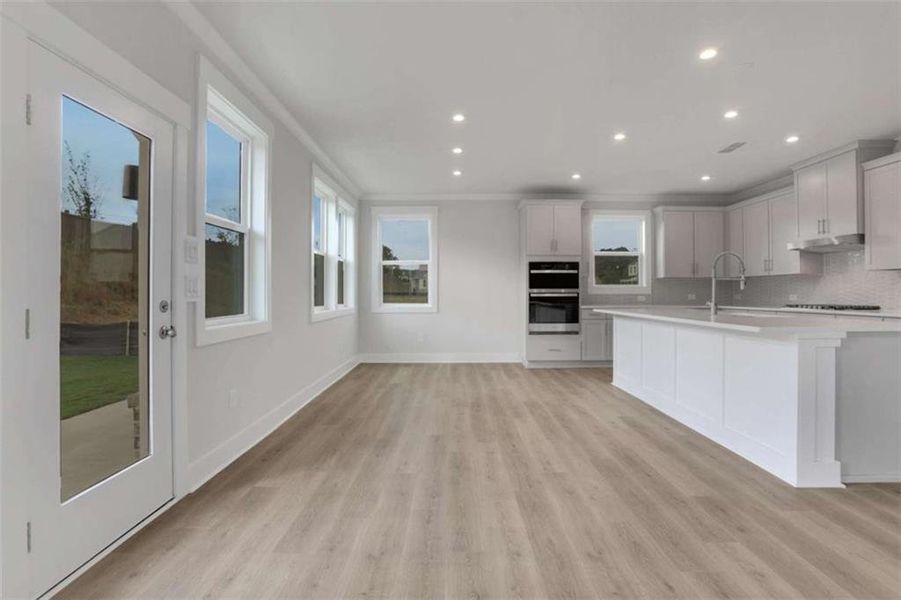 Spacious, unfurnished interior of a new home in The Paddocks at Doc Hughes, Buford (Image 22).