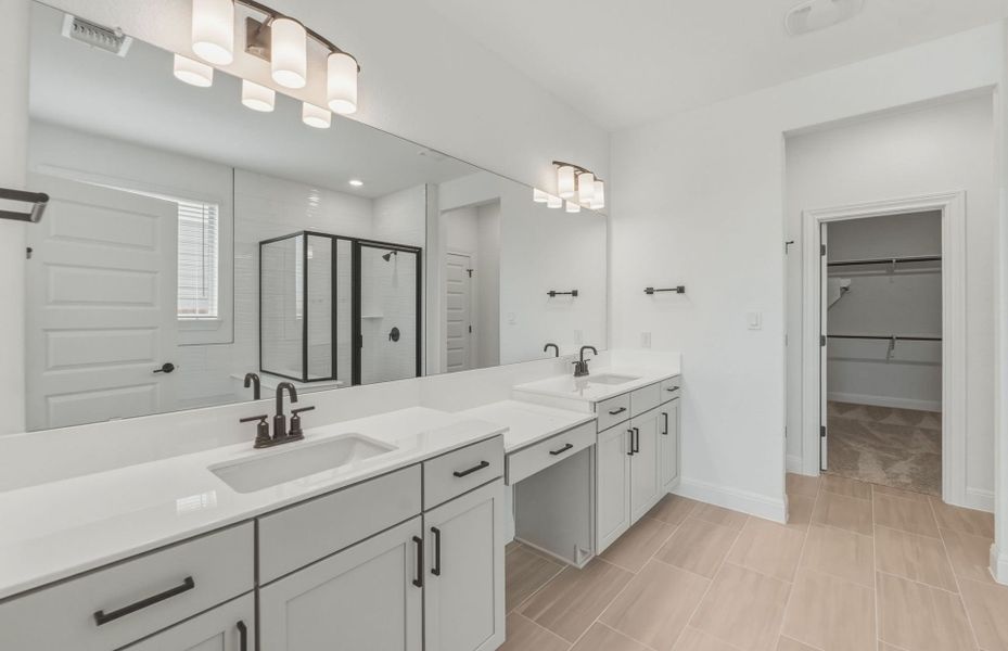 Representative furnished interior of a home built from the Woodland by Pulte Homes in Santa Rita Ranch, Liberty Hill (Image 5).
