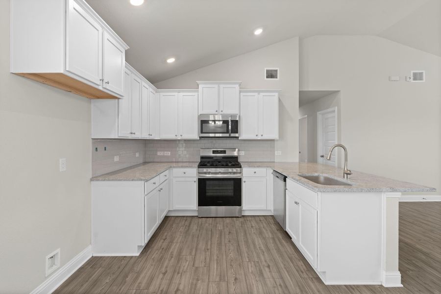 Furnished interior view inside a new home in Sunterra, Katy (Image 11).