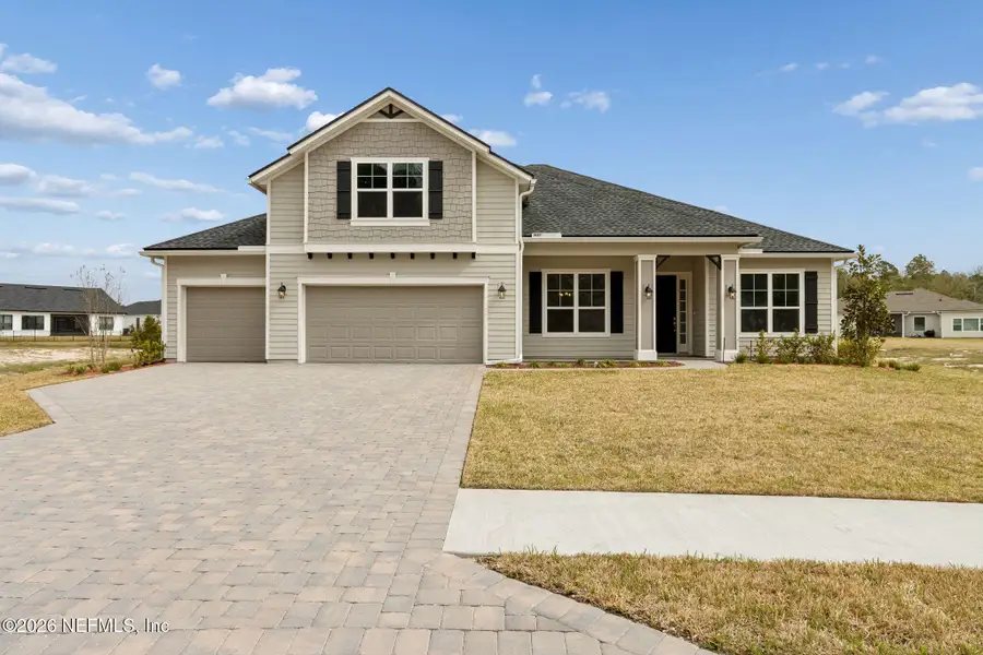 Front exterior of a new home in , Yulee, FL, highlighting curb appeal (Image 1). Front exterior of a new home in , Yulee, FL, highlighting curb appeal (Image 1).