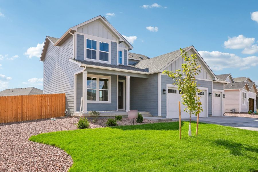 Front exterior of a new home in The Glen, Colorado Springs, CO, highlighting curb appeal (Image 2). Front exterior of a new home in The Glen, Colorado Springs, CO, highlighting curb appeal (Image 2).