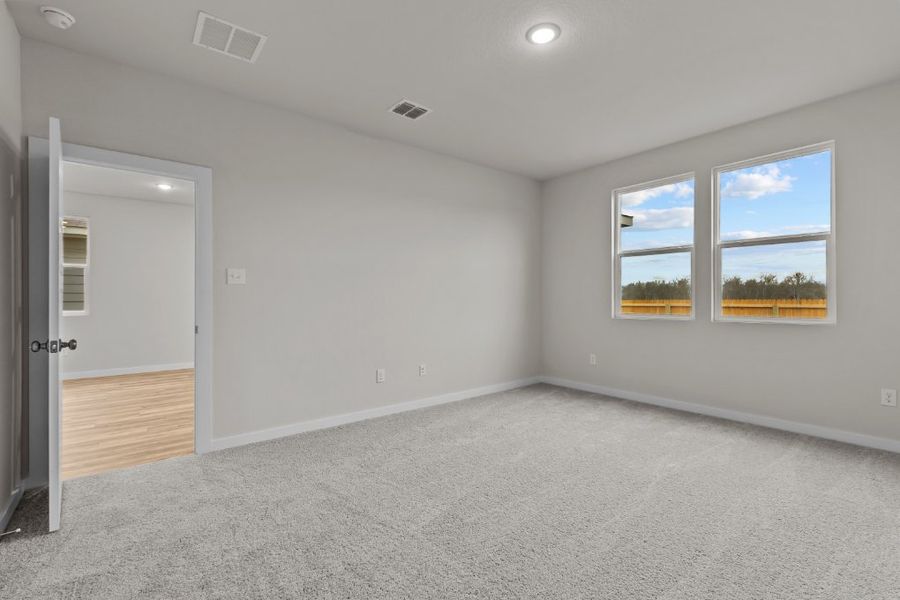 A room with a window and a door. A room with a window and a door.