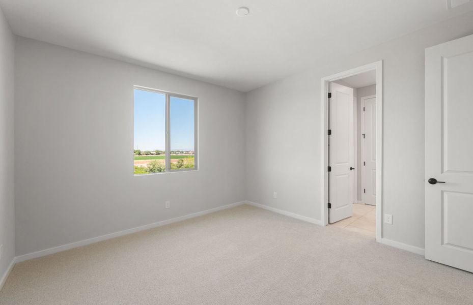 Spacious, unfurnished interior of a new home in Legado West, Queen Creek (Image 28).