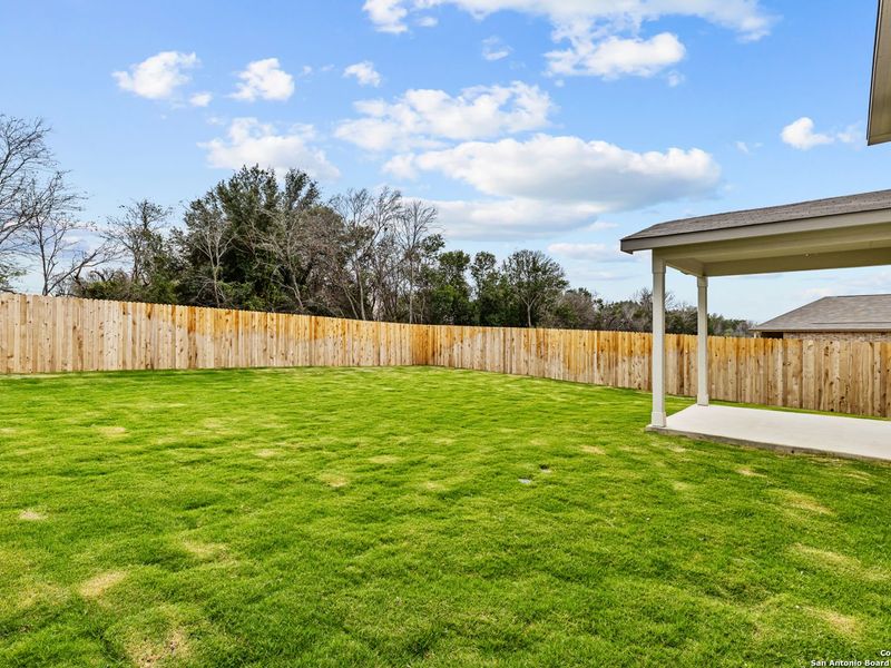 Exterior details and patio area of a home in Royal Crest, San Antonio (Image 19).