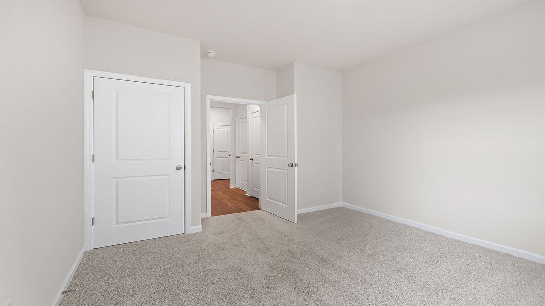 Spacious, unfurnished interior of a new home in Durbin Meadows Traditions, Fountain Inn (Image 15).