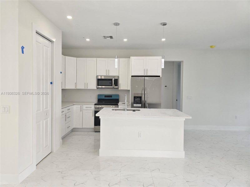 Furnished interior view inside a new home in , Lehigh Acres (Image 9).