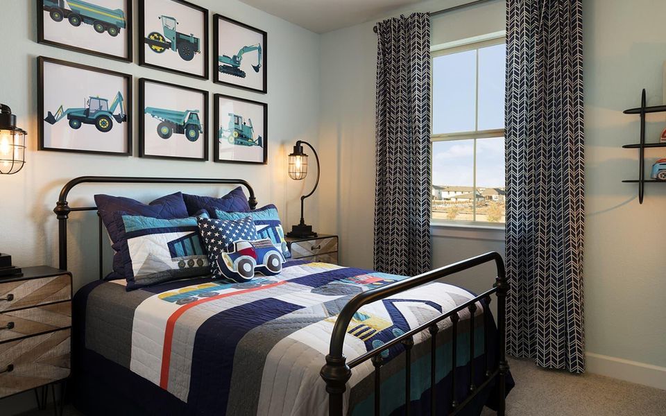 Carpeted bedroom with baseboards Carpeted bedroom with baseboards