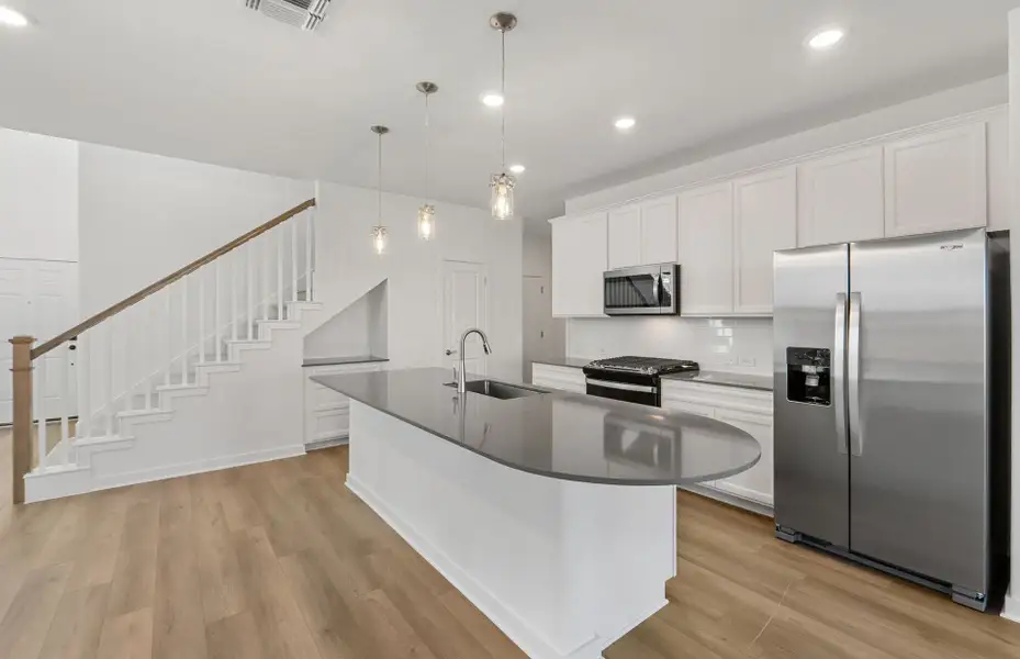 Furnished interior view inside a new home in Santa Rita Ranch, Liberty Hill (Image 8). Furnished interior view inside a new home in Santa Rita Ranch, Liberty Hill (Image 8).
