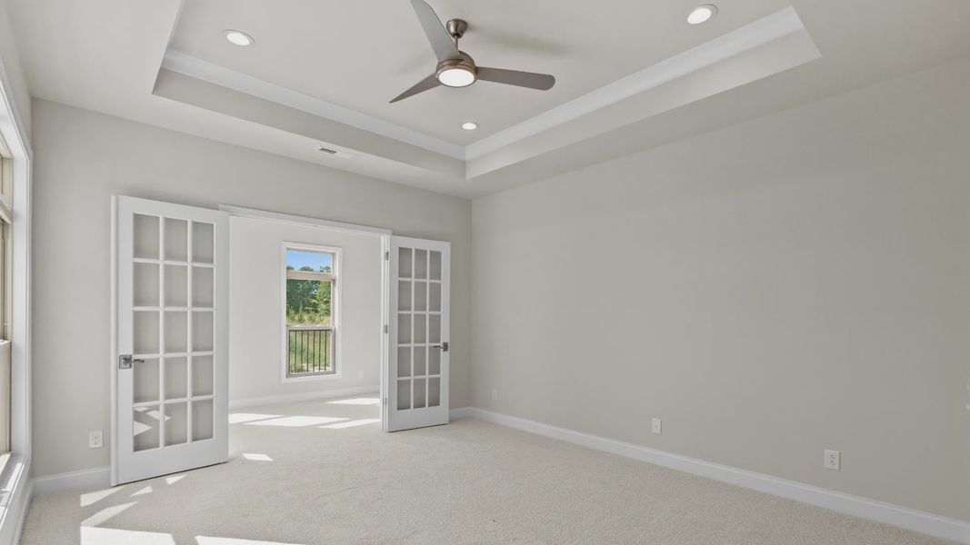 Spacious, unfurnished interior of a new home in Courtyards by Carrell, Ocean Isle Beach (Image 19). Spacious, unfurnished interior of a new home in Courtyards by Carrell, Ocean Isle Beach (Image 19).