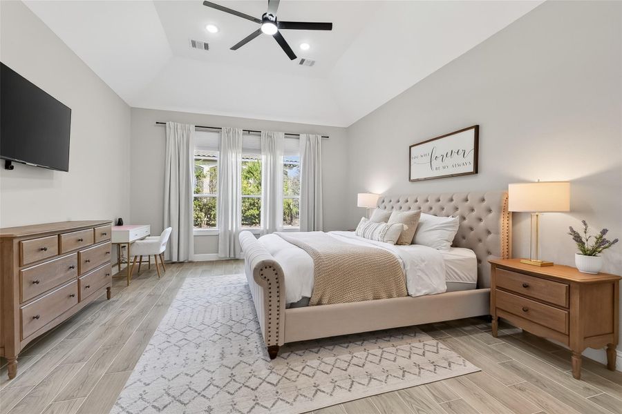 Primary suite featuring large windows and spacious layout. Primary suite featuring large windows and spacious layout.