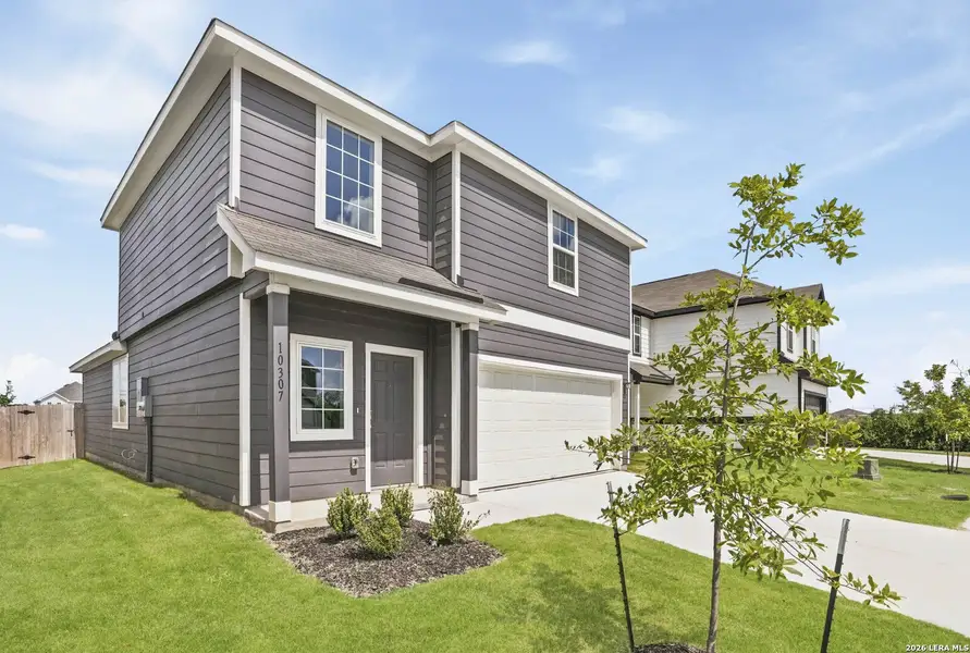 Front exterior of a new home in Applewhite Meadows, San Antonio, TX, highlighting curb appeal (Image 20). Front exterior of a new home in Applewhite Meadows, San Antonio, TX, highlighting curb appeal (Image 20).