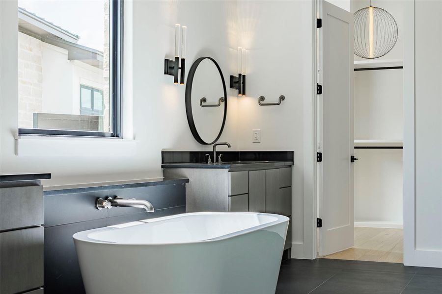 Soaking tub in owner's bathroom Soaking tub in owner's bathroom