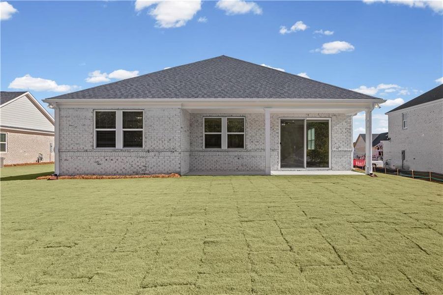 Exterior details and patio area of a home in Overland, Locust Grove (Image 20).