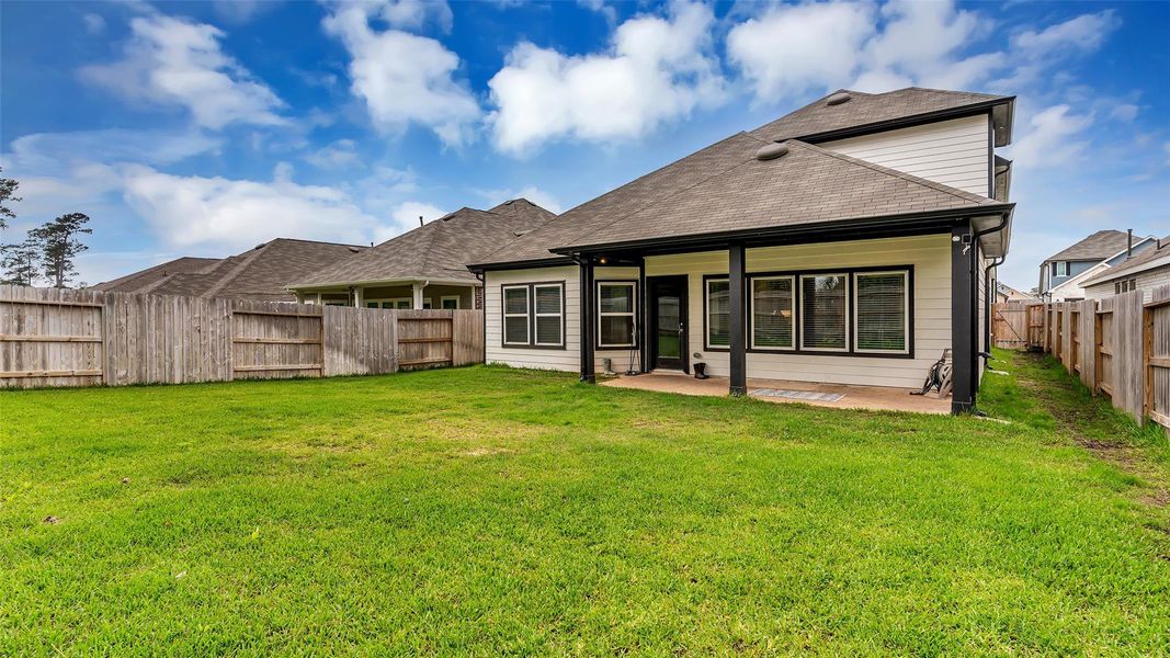 Exterior details and patio area of a home in , Willis (Image 23).