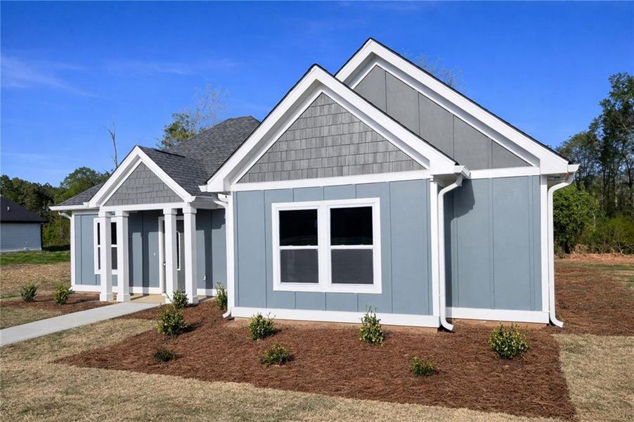 Front exterior of a new home in , Griffin, GA, highlighting curb appeal (Image 19).