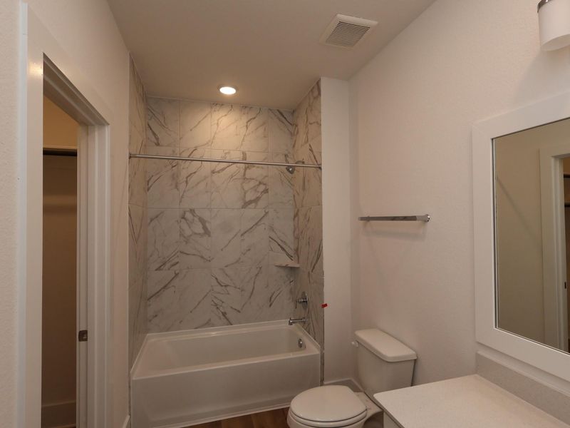 Furnished interior view inside a new home in Sorella, Tomball (Image 9).