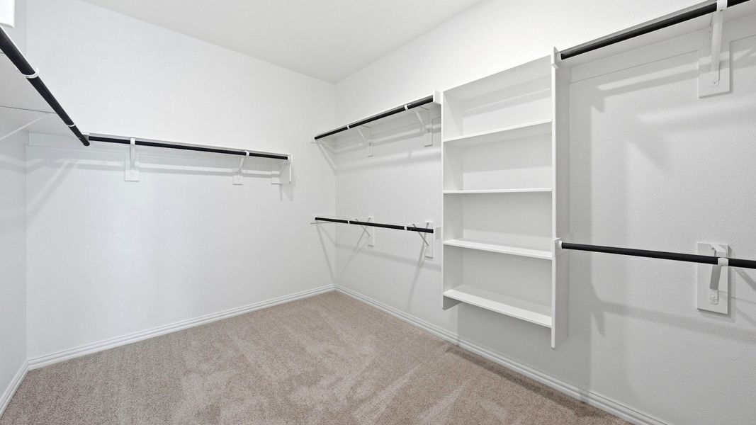Furnished interior view inside a new home in Oaks at San Gabriel, Georgetown (Image 26).