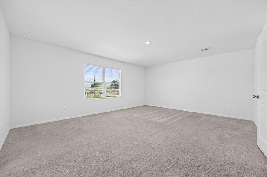 Huge Master bedroom with carpet throughout. Huge Master bedroom with carpet throughout.