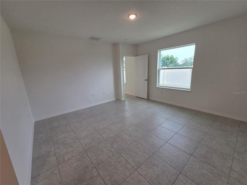 Spacious, unfurnished interior of a new home in Hammock Reserve, Haines City (Image 12). Spacious, unfurnished interior of a new home in Hammock Reserve, Haines City (Image 12).