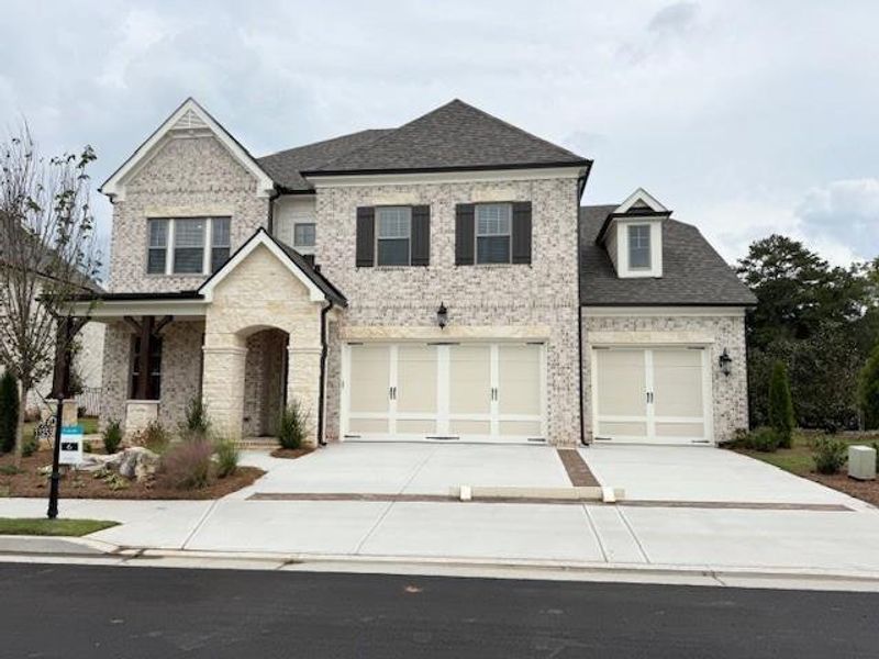 Front exterior of a new home in Knollwood, Johns Creek, GA, highlighting curb appeal (Image 29).