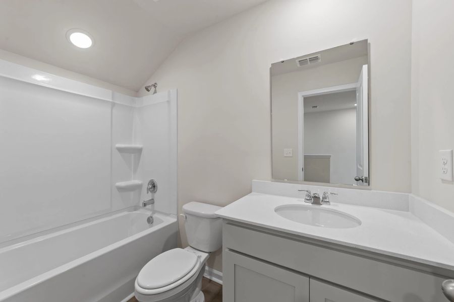 Furnished interior view inside a new home in Blue Heron Retreat, Little River (Image 10).