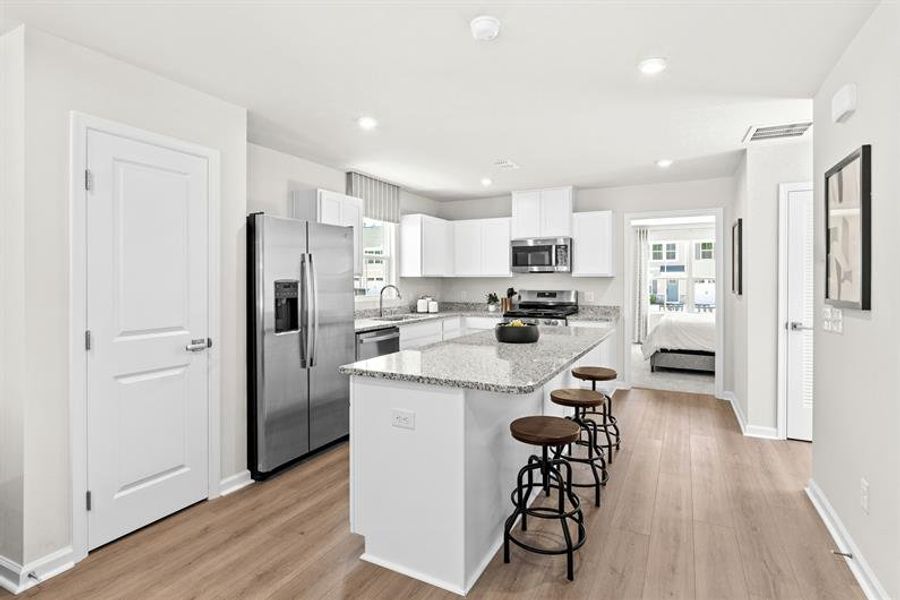 Representative furnished interior of a home built from the Reese by Ryan Homes in Middle Creek Village Single Family Homes, Bolivia (Image 3).